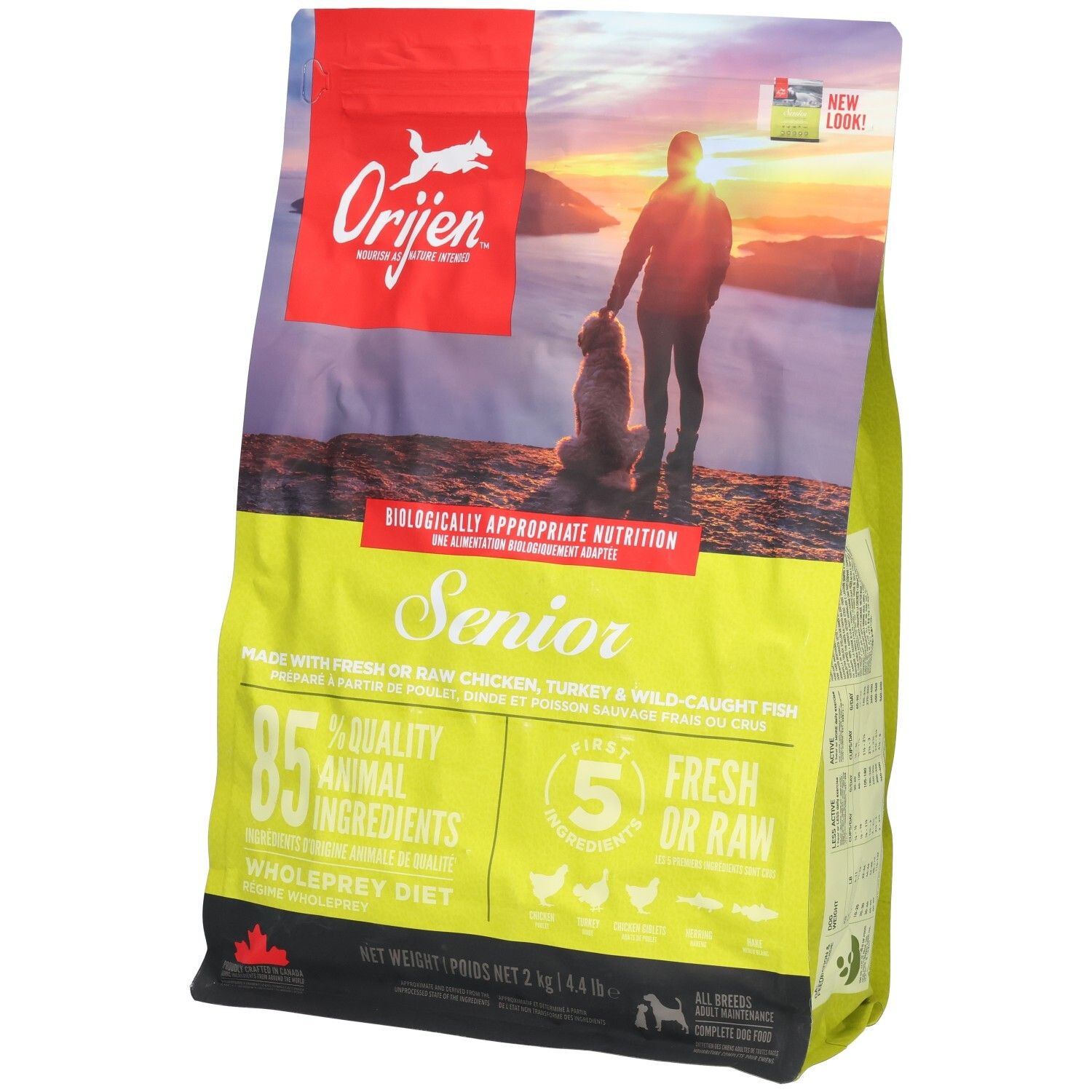 Sac de nourriture Orijen Senior pour chien avec image d'un homme et d'un chien au coucher du soleil.