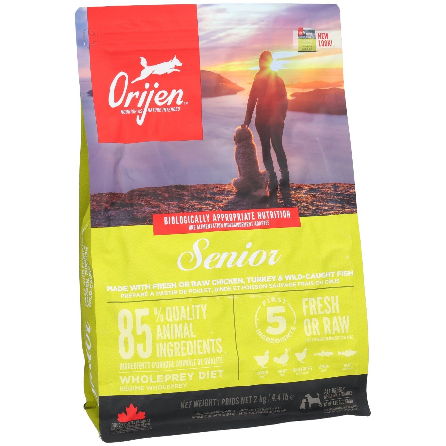 Sac de nourriture Orijen Senior pour chien avec image d'un homme et d'un chien au coucher du soleil.