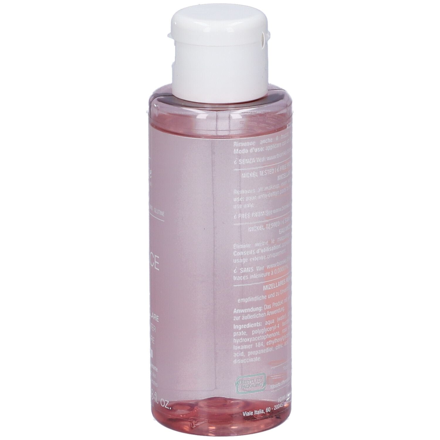 Dos du flacon. Texte multilingue. Flacon avec liquide rose. Bouchon blanc.