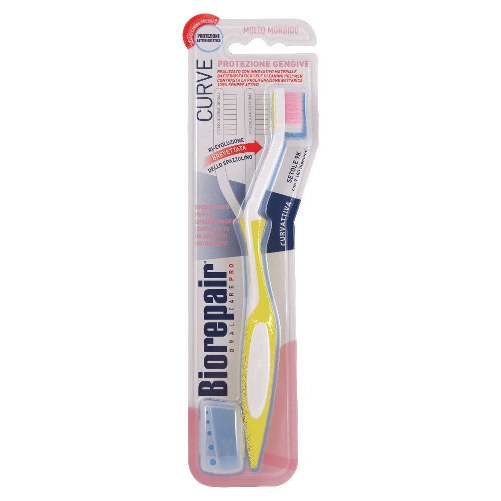 Brosse à dents jaune et blanche dans son emballage. Inscription : Biorepair Curve.
