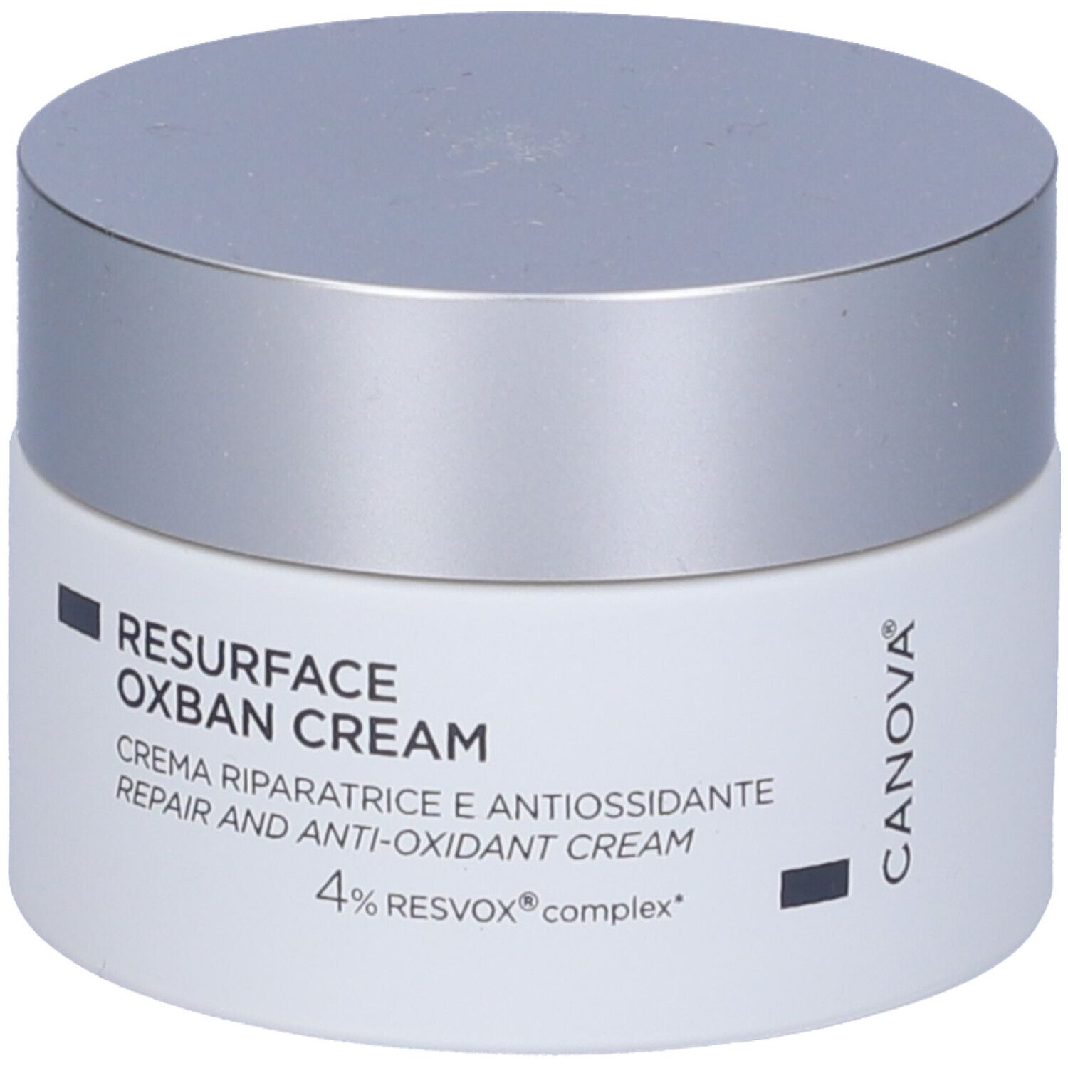 Pot de crème avec couvercle argenté. Inscription: RESURFACE OXBAN CREAM, Crème réparatrice et antioxydante, 4% RESVOX complex.