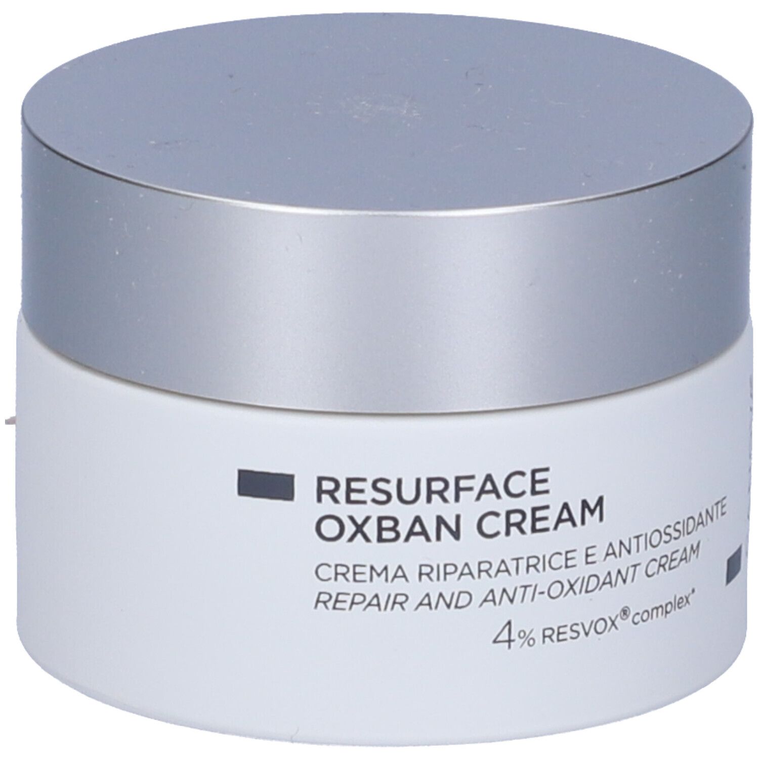 Pot de crème avec couvercle argenté. Inscription: RESURFACE OXBAN CREAM, Crème réparatrice et antioxydante, 4% RESVOX complex.