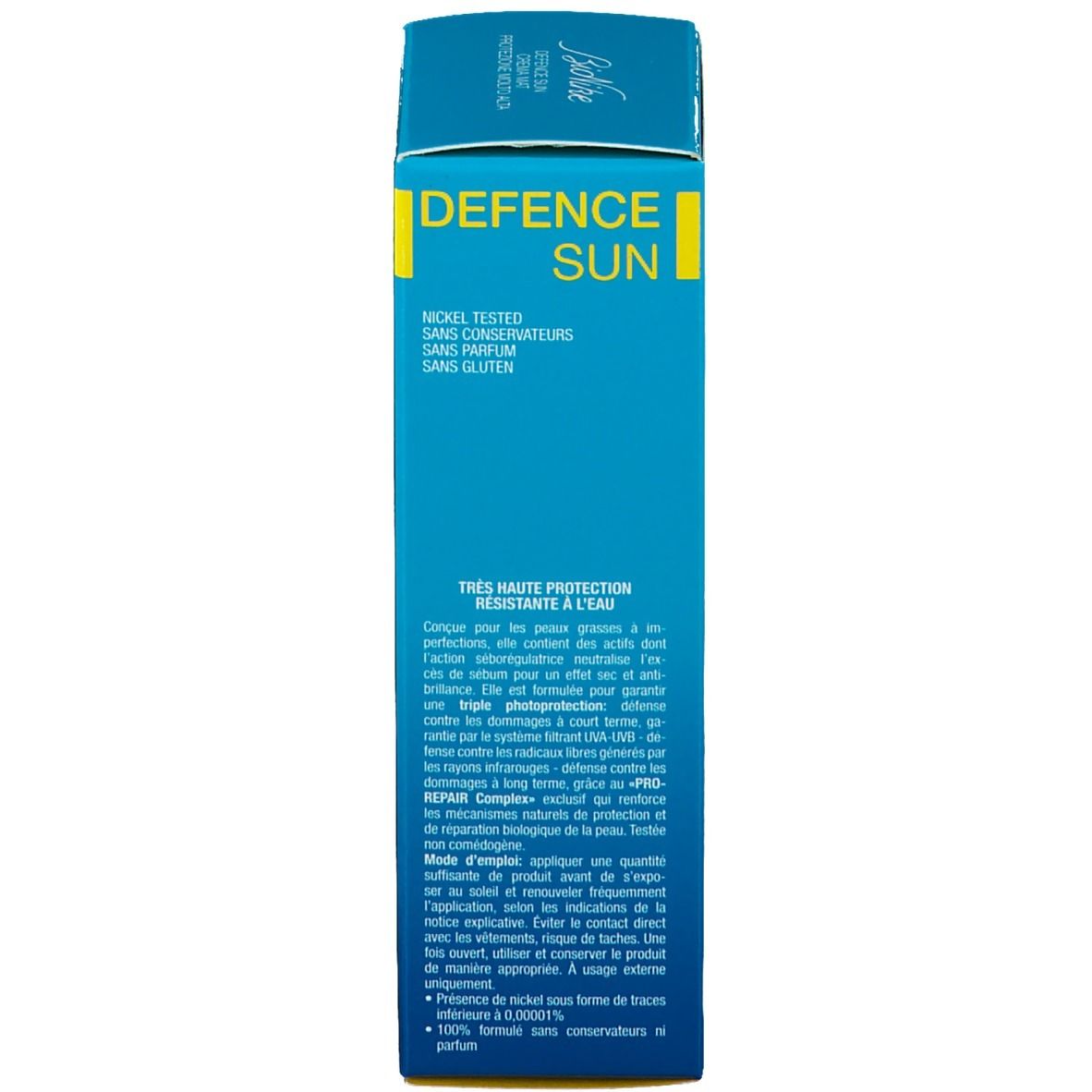 Dos de la boîte turquoise. Texte multilingue. Inscription : Defence Sun. Marque : BioNike. Avec ingrédients.