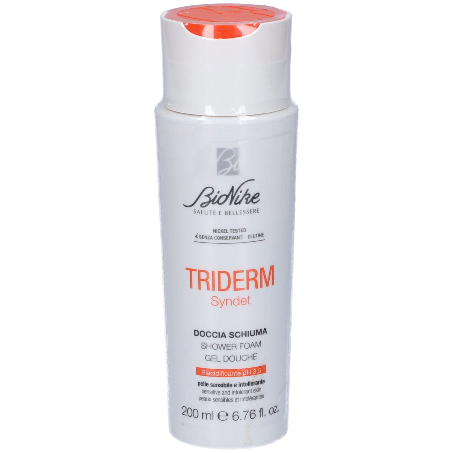 Flacon blanc avec bouchon orange. Inscription: Triderm Syndet, gel douche, pH 5.5. Marque: BioNike.