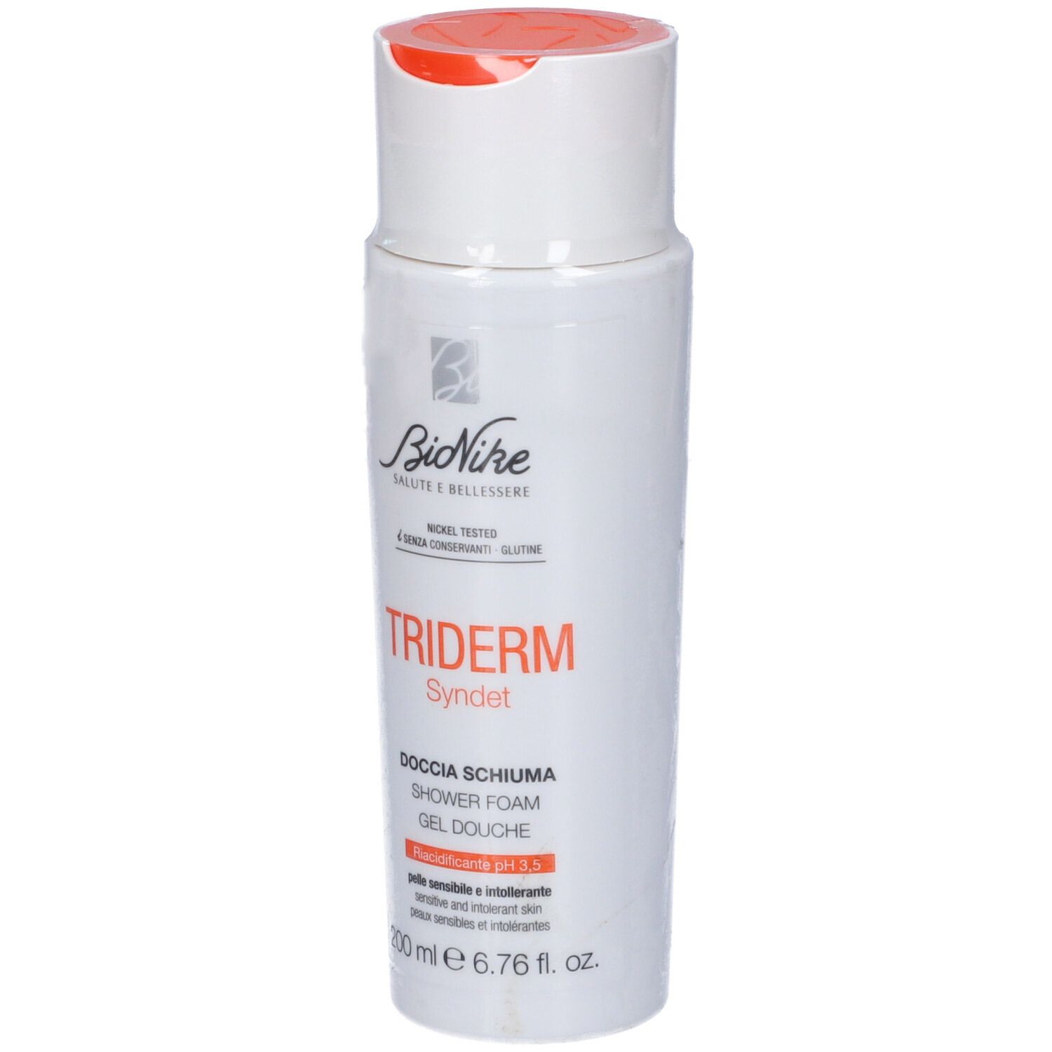 Flacon blanc avec bouchon orange. Inscription: Triderm Syndet, gel douche, pH 5.5. Marque: BioNike.
