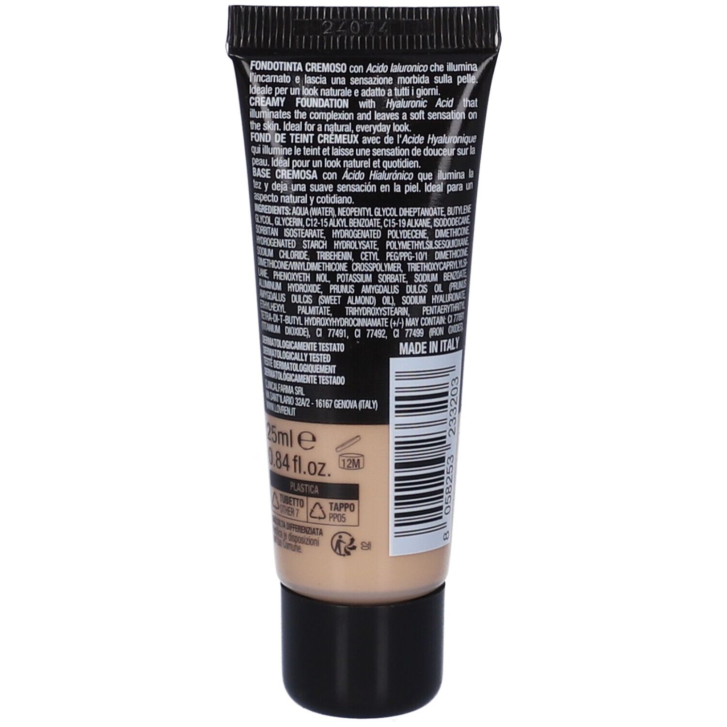 Dos du tube de fond de teint. Texte avec ingrédients et informations fabricant. Couleur beige du produit visible.