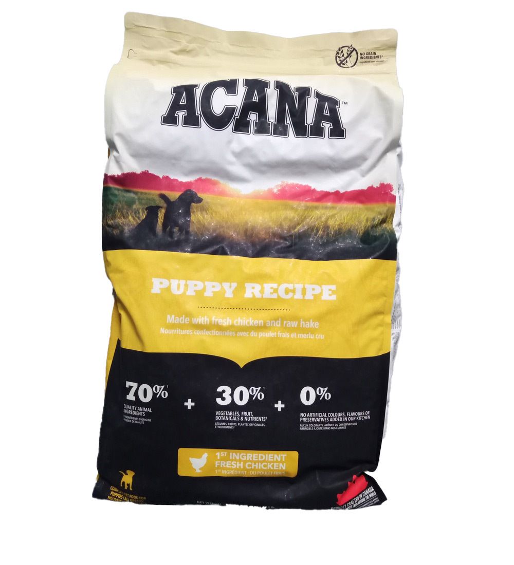 Sac de nourriture pour chiens ACANA PUPPY RECIPE. Contient 70% d'ingrédients animaux, 30% de fruits, légumes et plantes, 0% de céréales. 1er ingrédient : poulet frais.