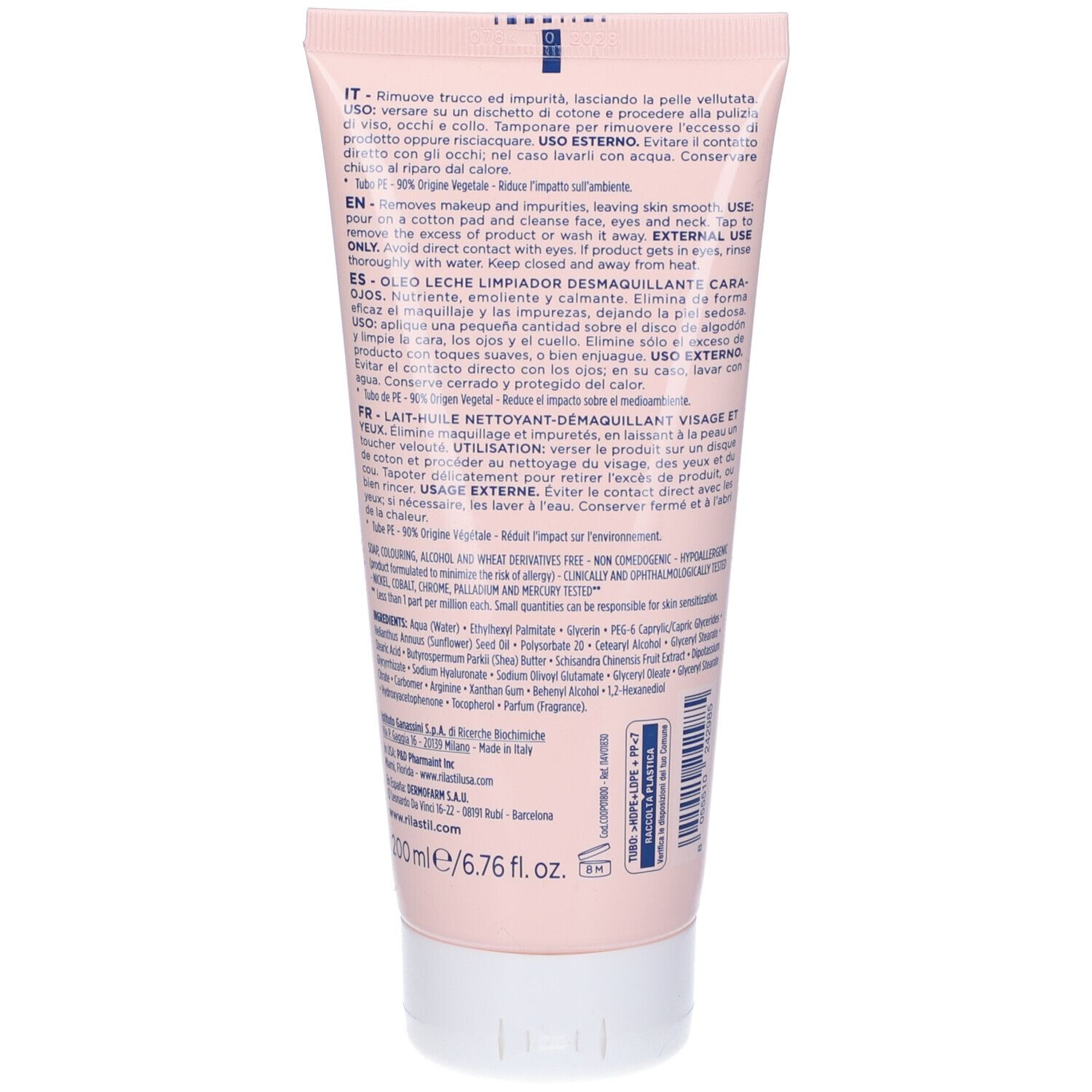 Dos du tube. Texte multilingue. Ingrédients et informations. Tube rose avec bouchon blanc.
