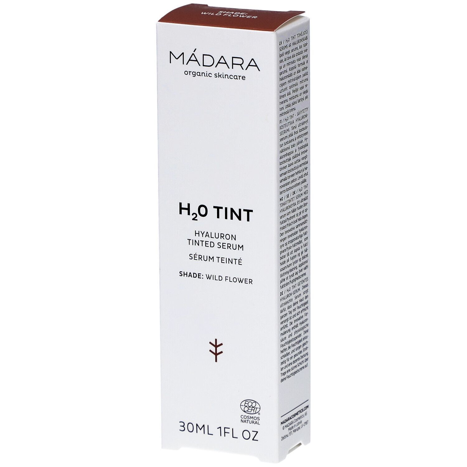 Emballage blanc avec couvercle marron. Inscription : MÁDARA, H2O TINT, Hyaluron Tinted Serum, Shade: Wild Flower. 30ml.
