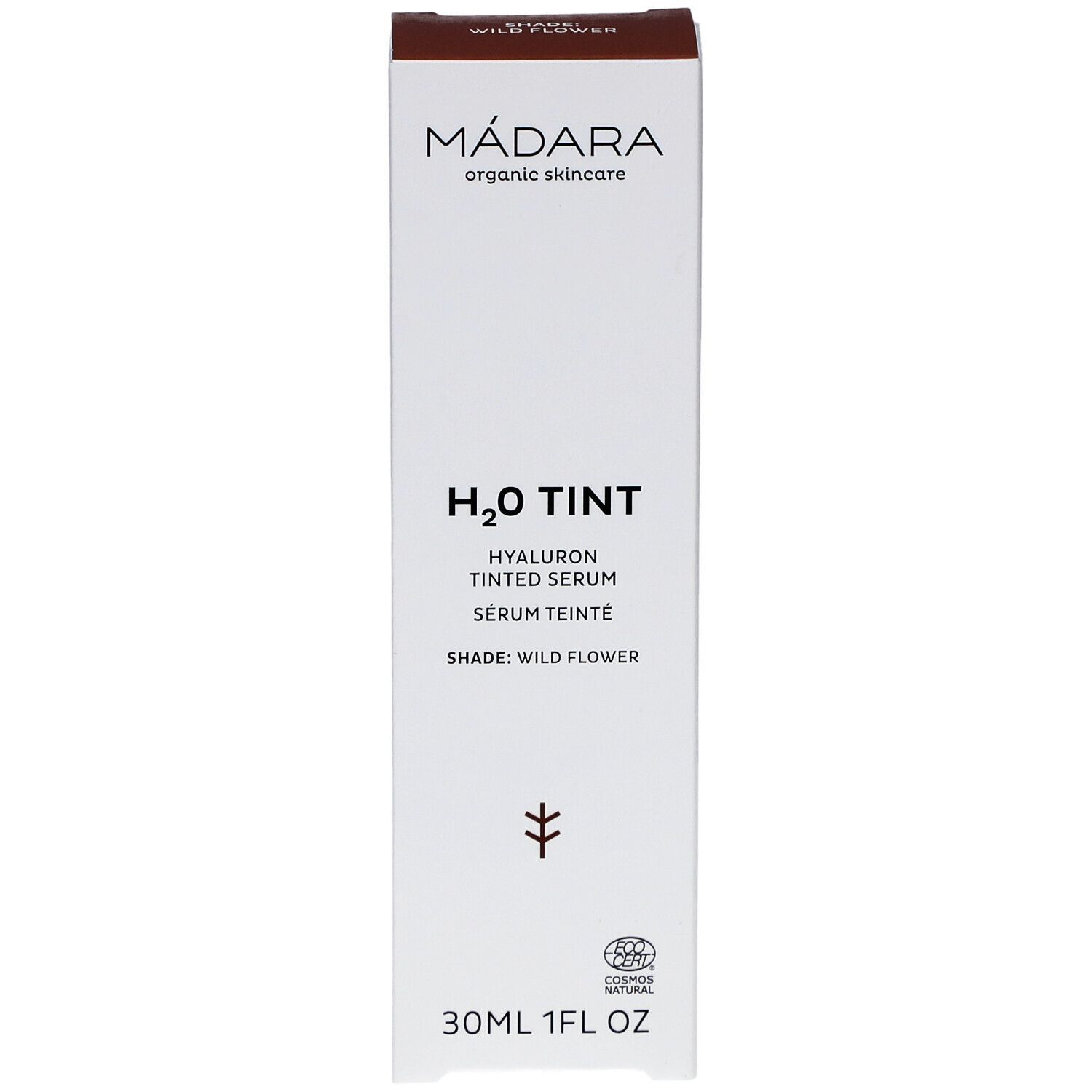 Emballage blanc avec couvercle marron. Inscription : MÁDARA, H2O TINT, Hyaluron Tinted Serum, Shade: Wild Flower. 30ml.