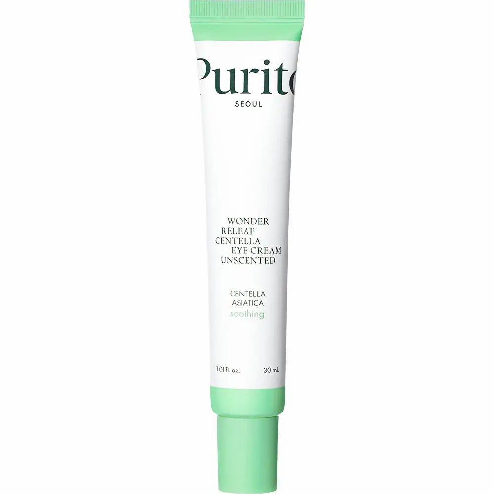 Gros plan d'un tube de crème pour les yeux. 'Purito' et le nom du produit sont clairement visibles. Tube blanc avec accents verts.