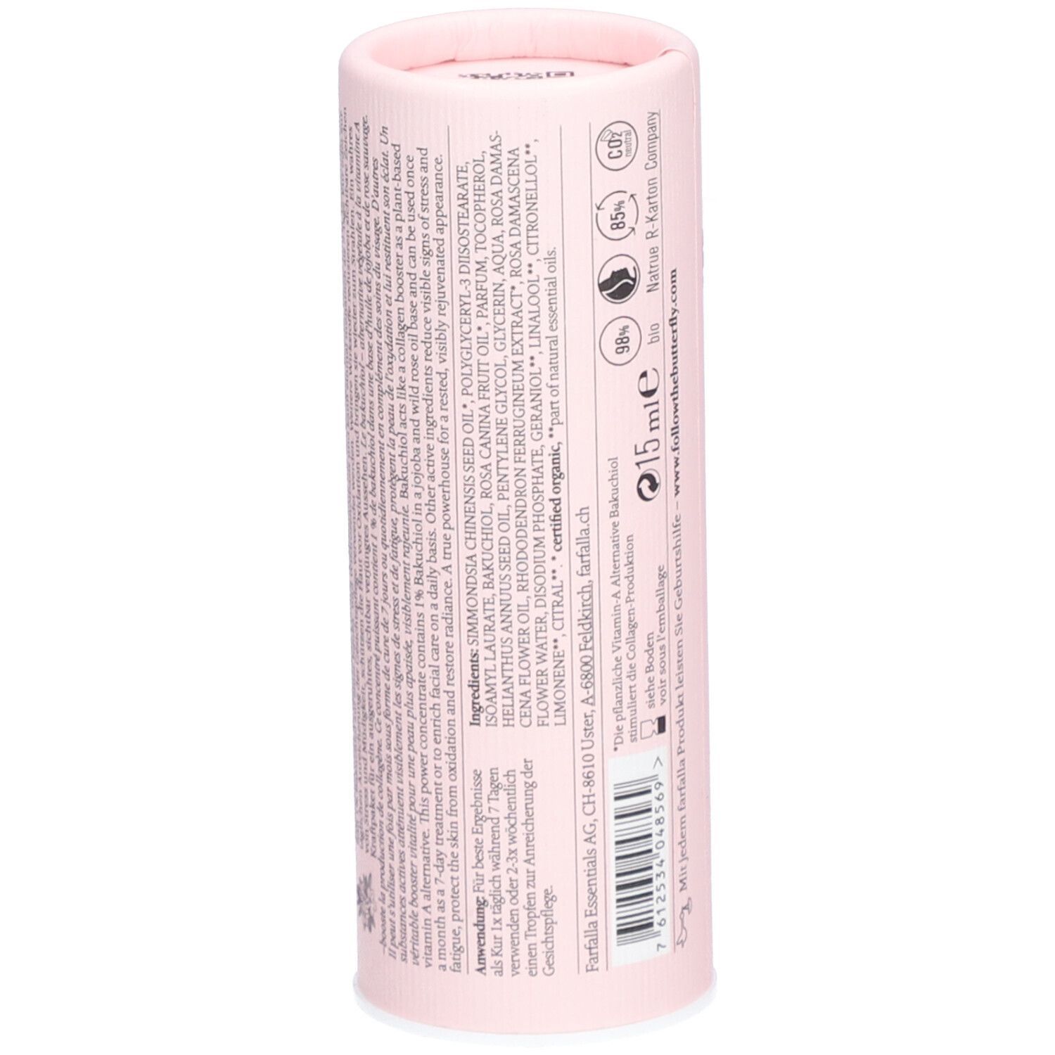 Dos de l'emballage cylindrique rose. Contient du texte, des ingrédients et des informations d'utilisation.
