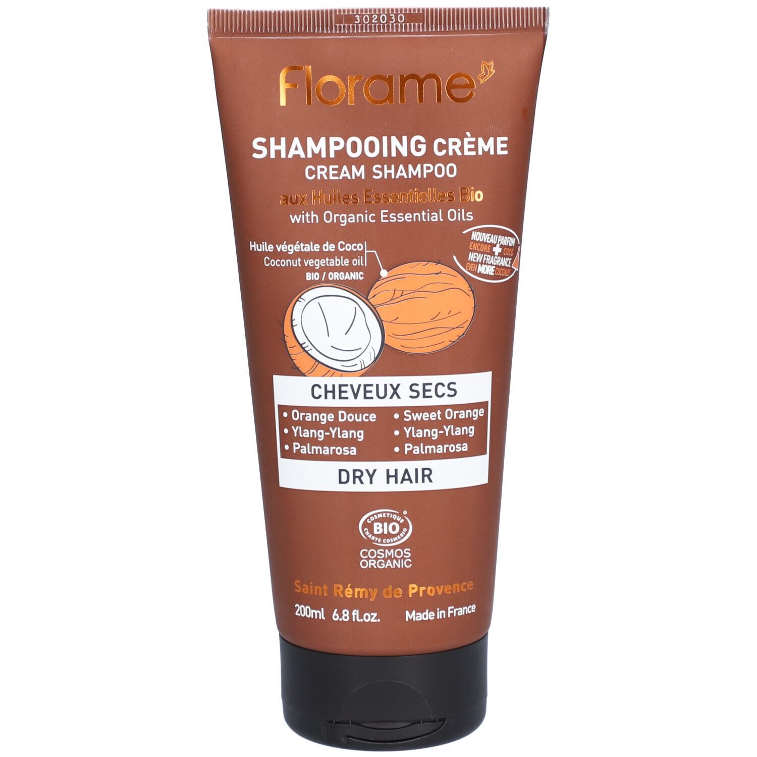 Tube marron de shampooing crème Florame pour cheveux secs. Texte et logos. Illustration de noix de coco.