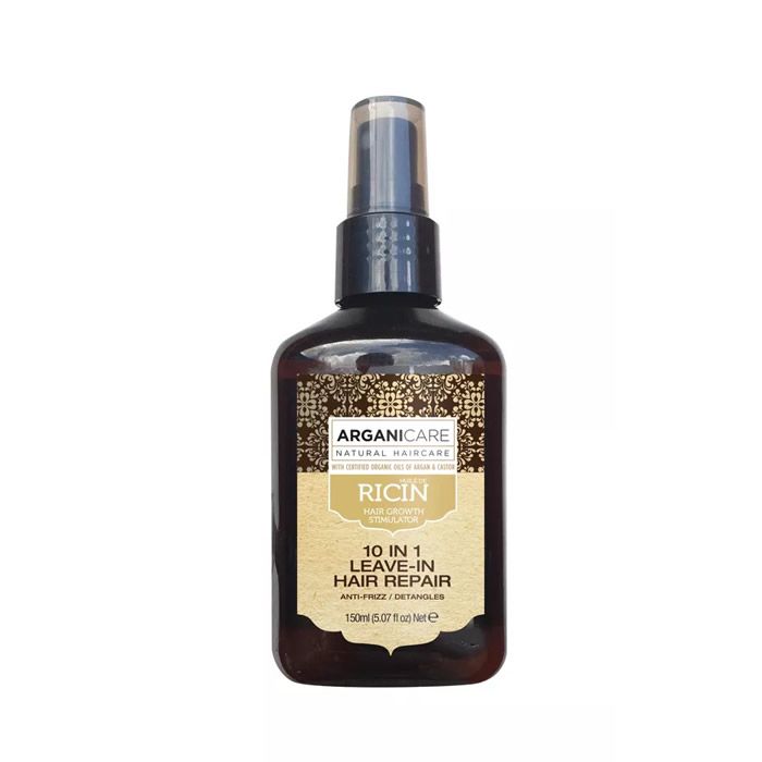 Arganicare spray réparateur sans rinçage. Flacon marron avec vaporisateur noir. Étiquette avec informations produit.