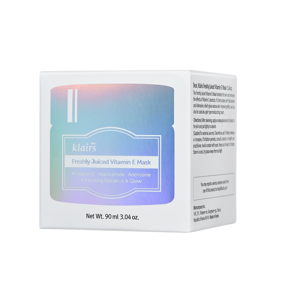 La boîte du masque à la vitamine E fraîchement pressée avec un design holographique.