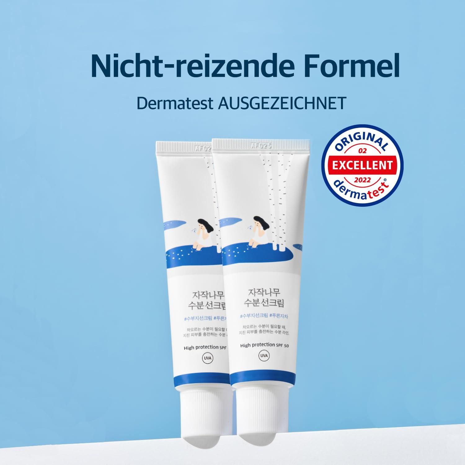 Deux tubes de crème solaire, sceau Dermatest 'EXCELLENT'.
