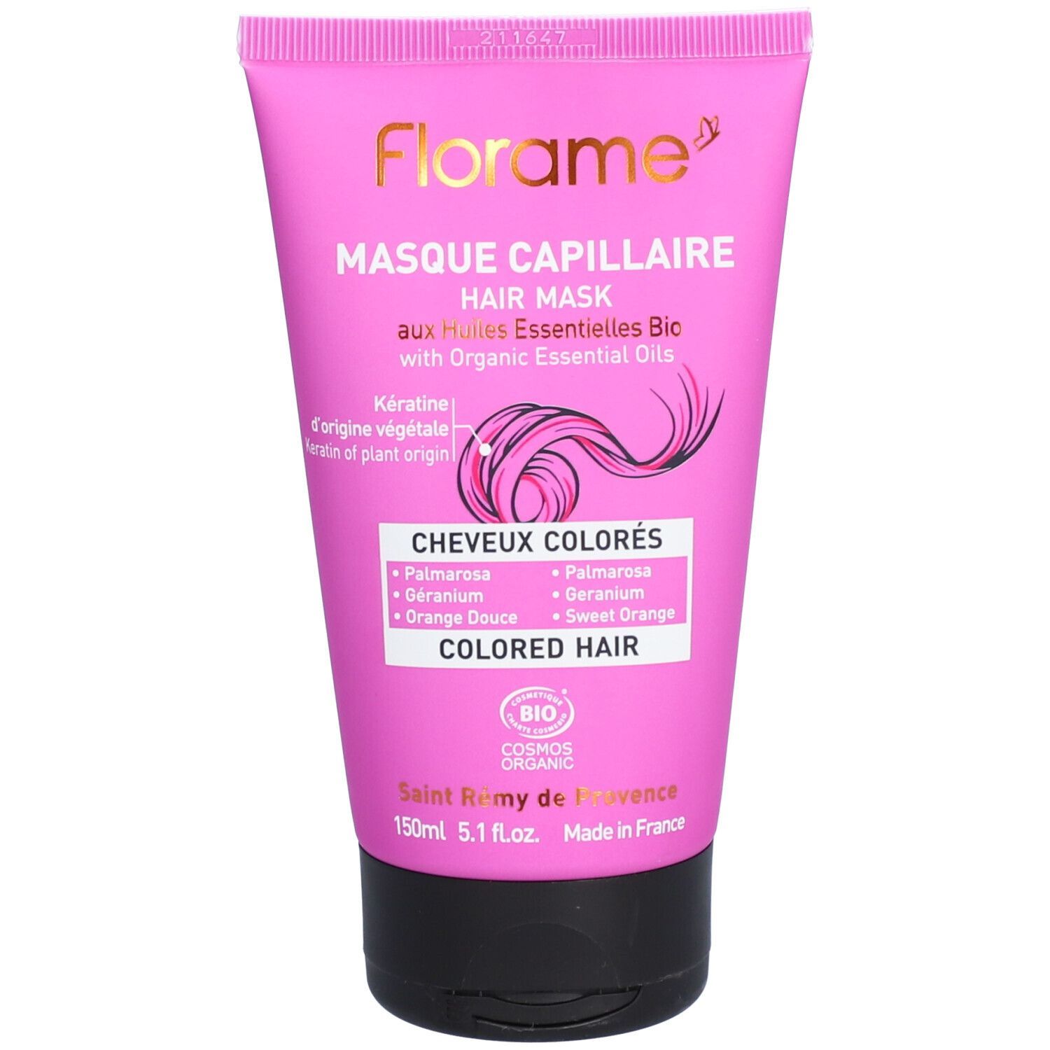 Tube rose avec bouchon noir. Masque capillaire Florame pour cheveux colorés. Texte et logo dorés et blancs. Certification bio.