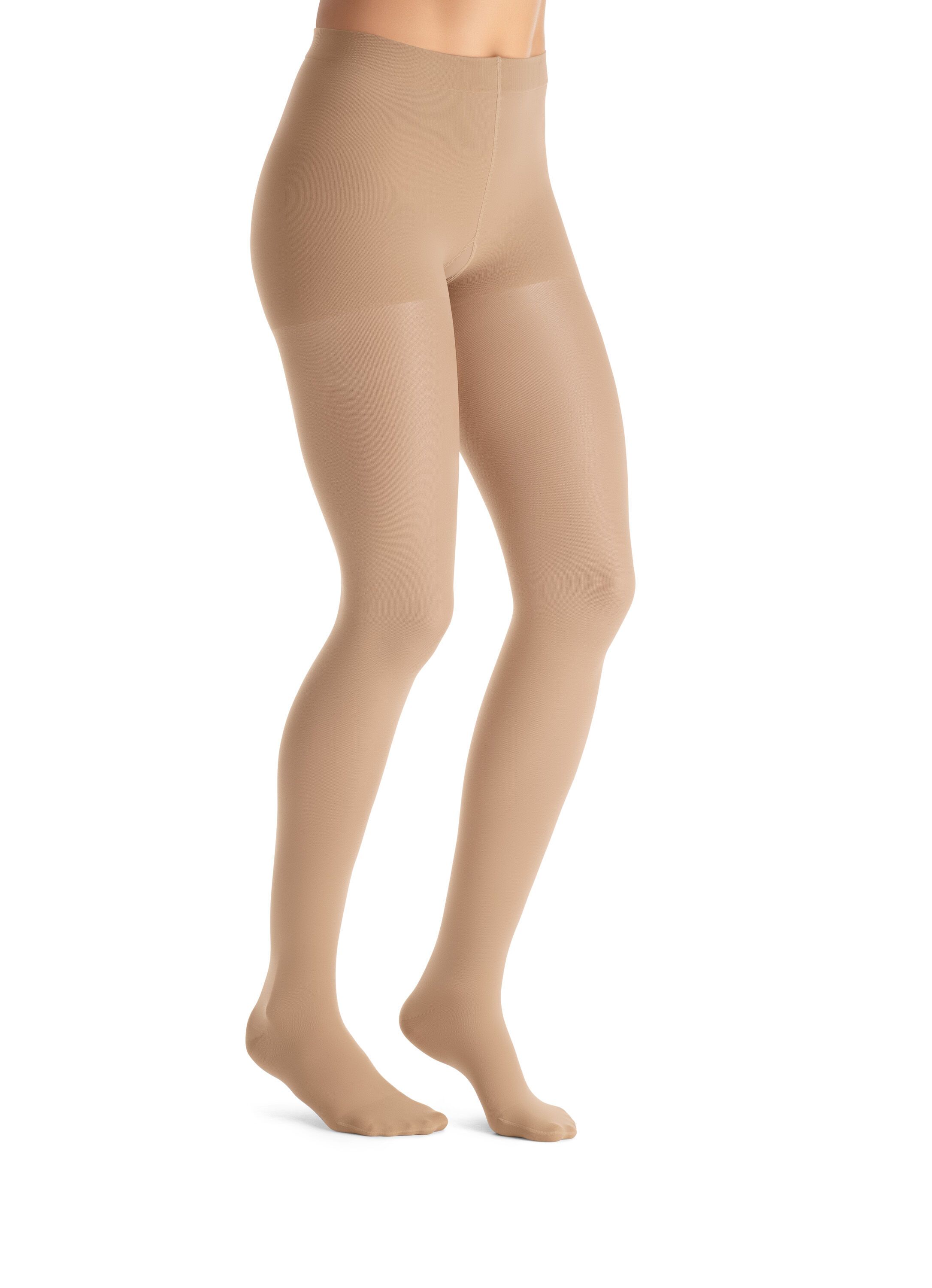 Collant de compression JOBST UltraSheer couleur chair. Vue latérale des jambes. Matériau lisse et transparent.