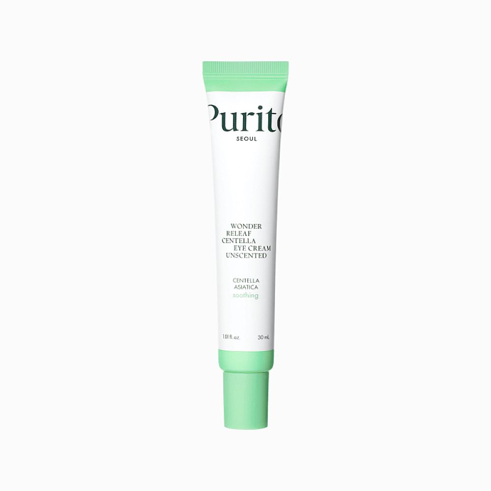Gros plan d'un tube de crème pour les yeux. 'Purito' et le nom du produit sont clairement visibles. Tube blanc avec accents verts.