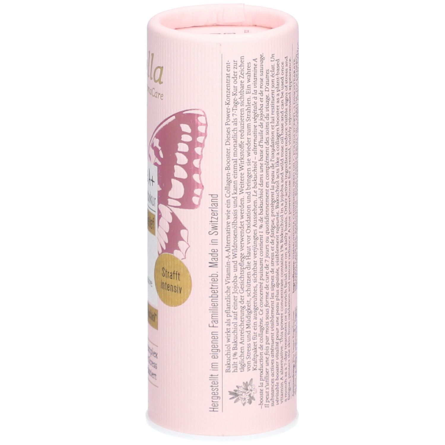 Vue latérale d'un emballage cylindrique rose. Contient du texte, dont "Made in Switzerland" et des informations.