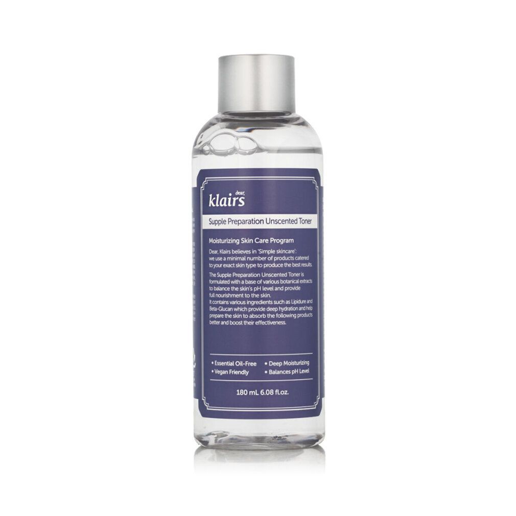 Flacon de toner clair avec bouchon argenté et étiquette violette. Texte sur l'étiquette. 180 ml.