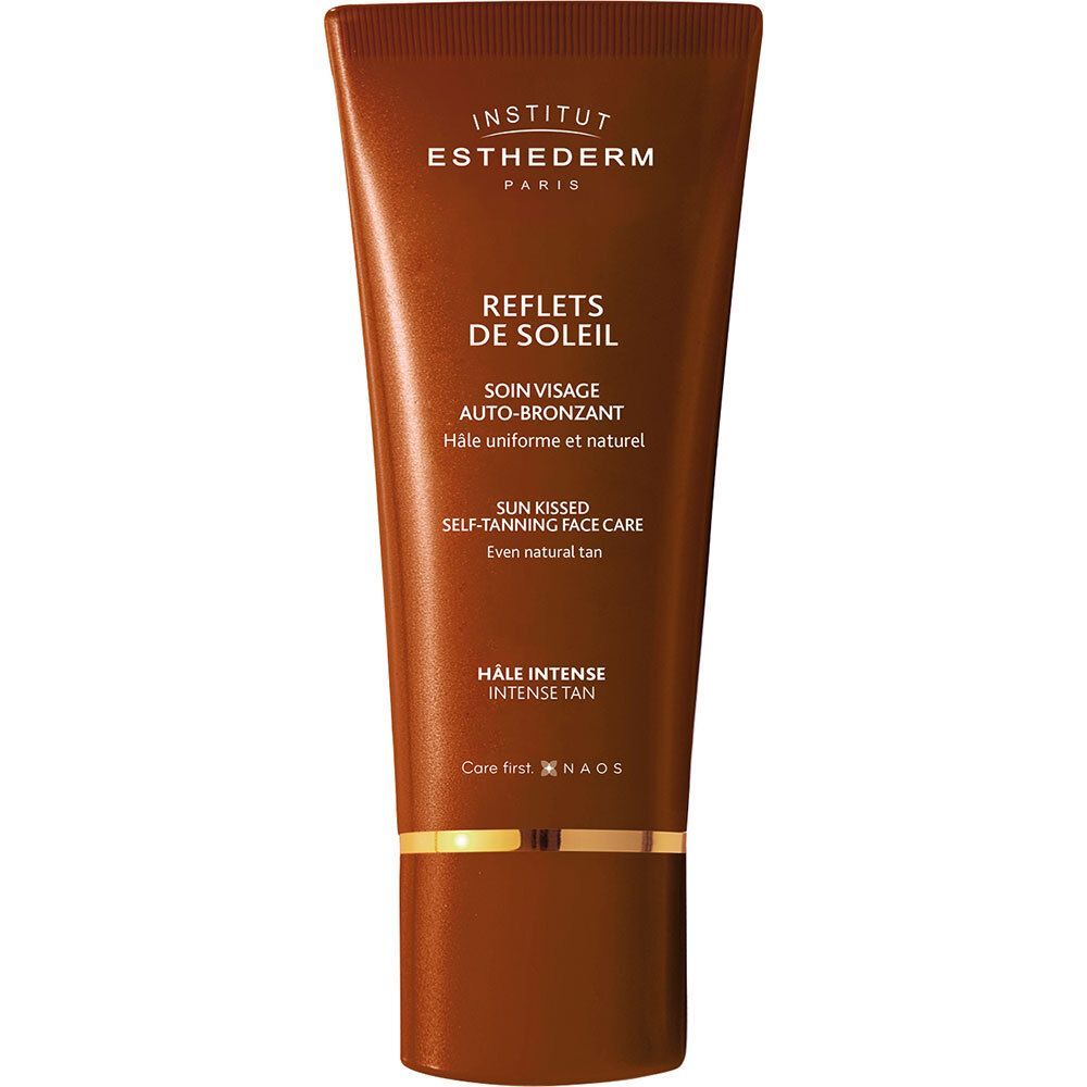 Tube marron avec texte INSTITUT ESTHEDERM PARIS. REFLETS DE SOLEIL, SOIN VISAGE AUTO-BRONZANT. HALE INTENSE. Crème.