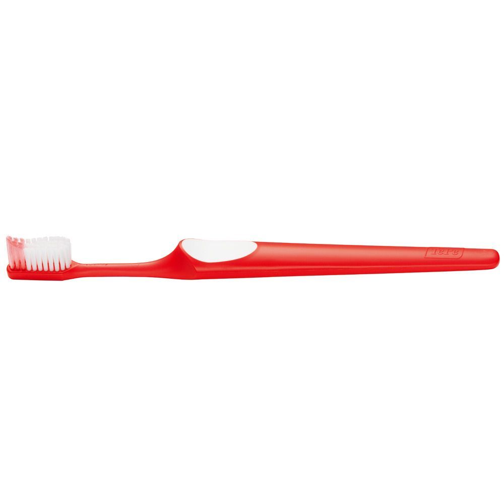 Brosse à dents rouge avec tête et manche blancs. La poignée a un repose-pouce blanc.