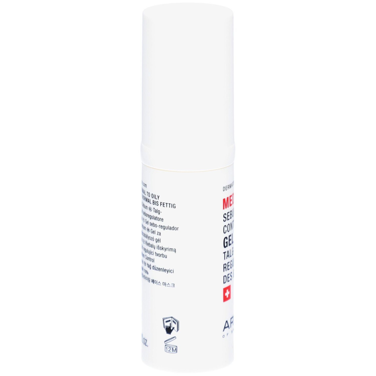 Flacon cylindrique blanc avec texte rouge: MED Sebum Control Gel. Croix suisse. Marque: ARTEMIS.