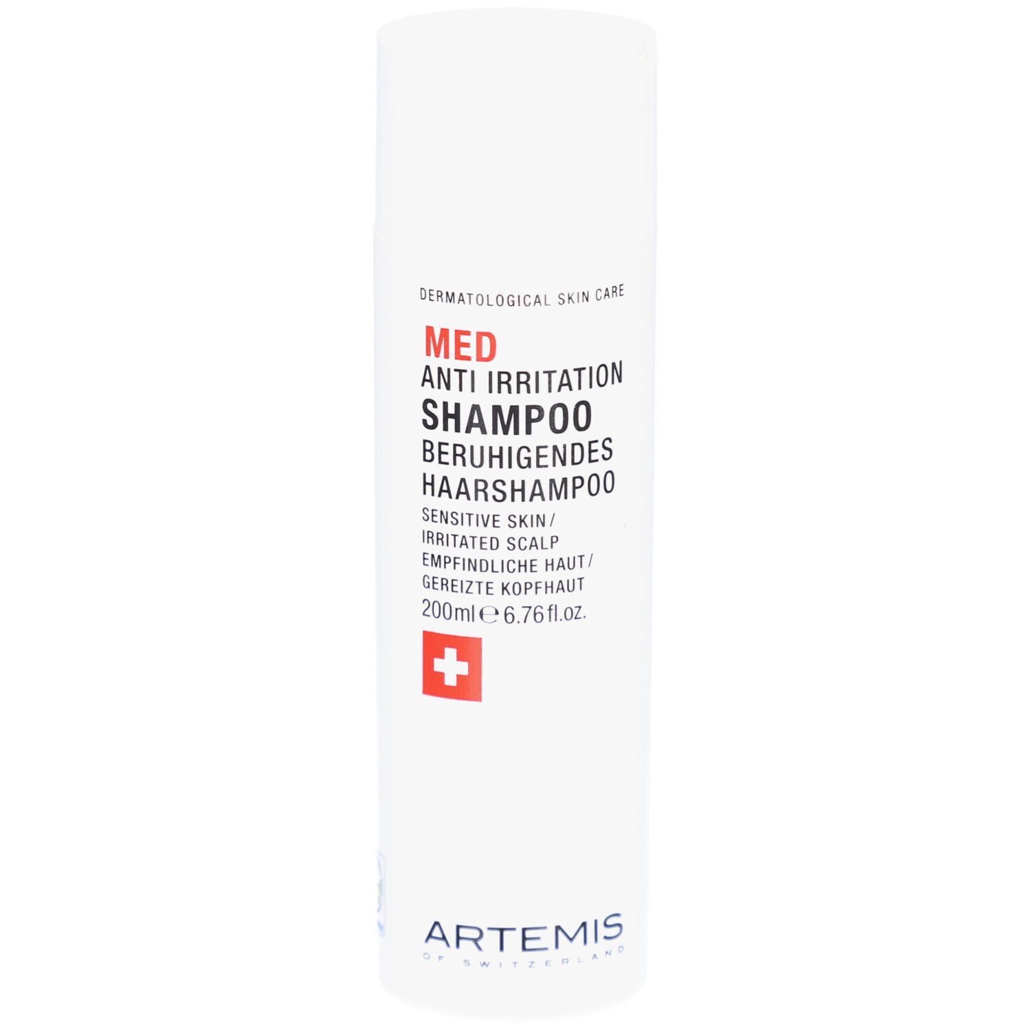 Flacon blanc avec texte rouge et noir. Croix suisse. Nom du produit: Med Anti Irritation Shampoo. Marque: Artemis.